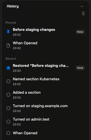 History panel: Before staging changes and When Opened pinned, recent saves from Turned on admin.test to Restored Before staging changes